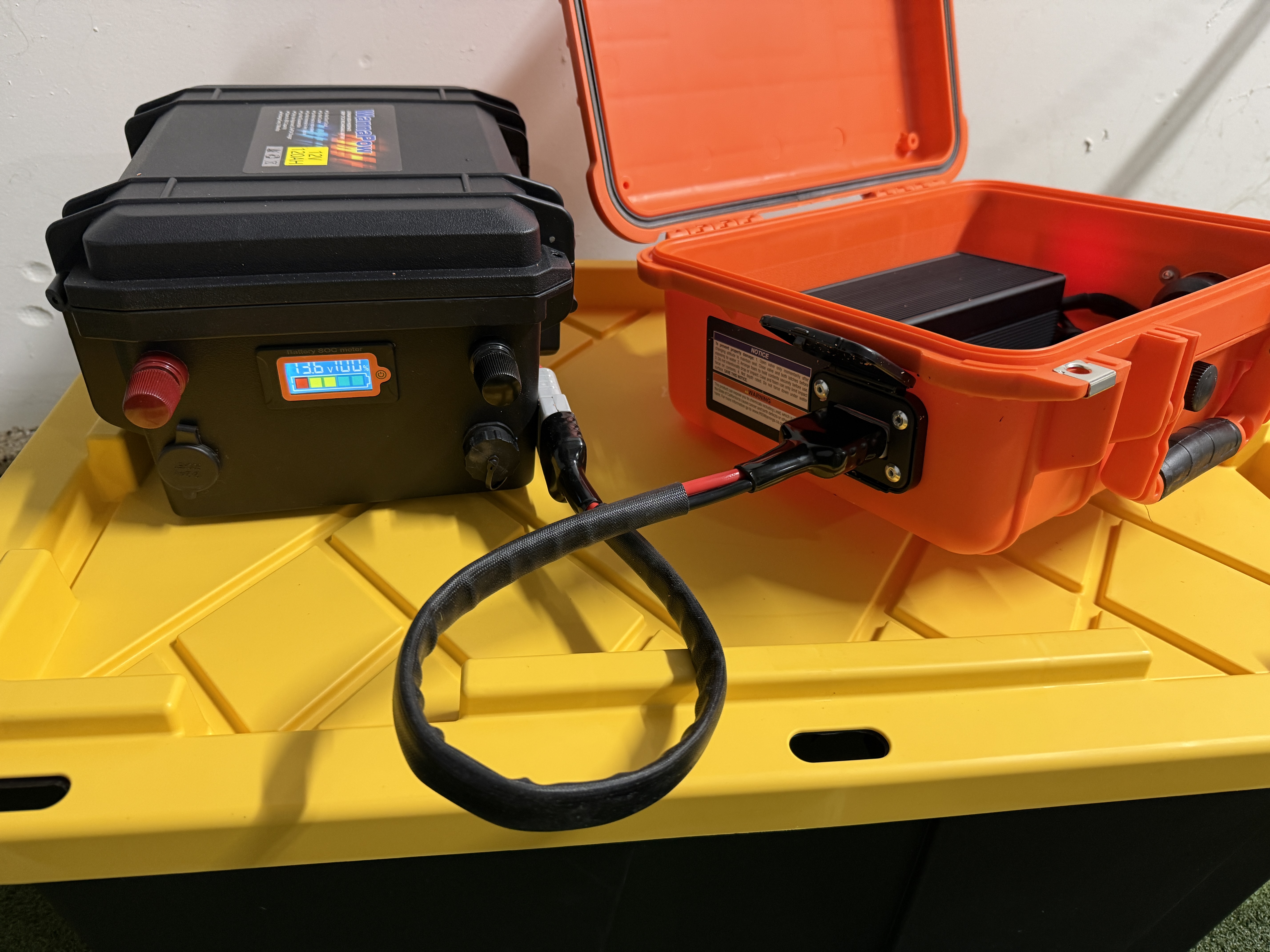 Battery box connected to charger in Apache case